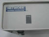 Network Equipment Technologies SPX/5 logo and Power button on top panel — close-up