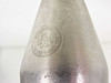 Close-up of Waukesha Fluid Handling stamped logo and date code on the conical body of the stainless steel KF reducer fitting