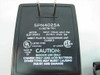 Motorola SPN4025A label showing model SLSF-4AH12, 120VAC input, 12VDC 6W output, UL and CSA listings