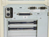Dell Dimension XPS P90 — rear I/O panel showing dual PS/2 ports, parallel port, two DB-9 serial ports labeled 10101-1 and 10101-2, and empty expansion slot covers