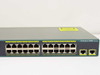 Cisco WS-C2960-24TT-L front panel straight-on view showing 24 RJ-45 10/100 ports in two banks plus 2 uplink ports and Catalyst 2960 Series label