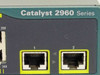 Cisco Catalyst 2960 Series front panel close-up of two RJ-45 uplink ports labeled 1 and 2