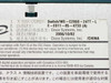 Cisco WS-C2960-24TT-L bottom regulatory label showing model number, Cisco Systems manufacturer info, and manufacture date 2006/10/02 Made in China