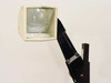 Elmo HP-L14 projection head close-up — lens and reflector assembly on folding arm