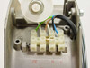 ebm-papst W2E200-HH82-05 terminal box interior with PE N L screw terminals and green yellow brown blue wiring