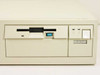 IBM PS/2 Model 56 front drive bay close-up showing 1.44MB 3.5-inch floppy drive with blue eject button and model/serial number label