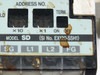 SMC EX120-SSH1 label closeup showing Model SD, SI No. EX120-SSH1, address rotary switches x10 and x1, TERM ON/OFF switch, and SG L1 L2 FG terminal labels