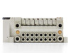 SMC EX120-SSH1 valve manifold assembly – bottom/port view showing 16 pneumatic push-in fittings ports across the manifold base and two EXH exhaust ports