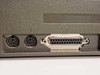 IBM PS/2 Model 30 rear port detail showing two PS/2 mini-DIN mouse and keyboard ports and DB-25 parallel port