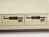 IBM PS/2 Model 30 front floppy drives close-up showing Drive A and Drive B 3.5-inch drives with blue eject buttons