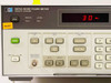 HP 8970A front panel left section — PRESET button, LINE switch, SOURCE ENR, SWEEP START/STOP/STEP FREQ controls, FIXED FREQ section, noise source drive output BNC, numeric keypad