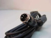 8-pin Mini-DIN male connector end of black DB9 serial cable – close-up front view