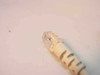 RJ45 connector end of serial console terminal cable — close-up showing clear plug and wiring