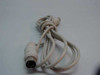 Full length view of beige AT keyboard extension cable showing both male and female DIN-5 connectors