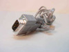 RJ45 to DB9 serial console cable showing DB9 male connector end and RJ45 plug, full cable view