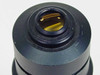 Elmo Projection Lens – top-down view of amber multi-coated rear lens element with minor dust on barrel rim
