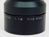 Elmo Projection Lens – close-up of barrel engraving reading LENS 1:1.8 f=12.5mm confirming specs