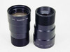 Bell & Howell 16mm Projection Lens 3 Inch f/1.6 — side view of both lenses showing engraved markings and barrel finish