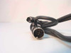 Close-up of PS/2 mini-DIN 6-pin connector and large multi-pin DIN POS connector ends