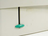 HP RB1-8935 LaserJet 4000 paper tray — close-up of teal retention clip on tray side