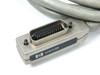 HP 10833B GPIB cable — angled view of second connector showing 24-pin contact array, HP logo label, and locking screws
