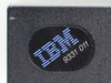 Close-up of IBM 9331 011 logo badge on front panel of the external floppy drive enclosure