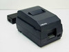 Epson TM-U200B Micros M119B dot matrix receipt printer – right-front three-quarter view with external power supply alongside, dark gray housing, paper slot and receipt exit visible