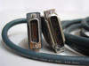 Close-up of dual DB-style multi-pin connectors on the 56767-010-994 Cisco to NetPath 64 cable