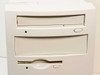 Packard Bell Multimedia 820 — close-up of front drive bays showing CD-ROM drive, second 5.25-inch bay, and 3.5-inch floppy drive