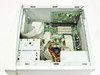 Packard Bell Multimedia 820 interior view with side panel removed showing motherboard, Cyrix processor with fan, RAM slots, ISA and PCI expansion slots, ribbon cables, and power supply