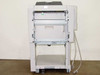 Konica Minolta FS-603 Booklet Finisher – rear view with side access panels open, internal stapling and folding mechanism visible, power and data cable visible