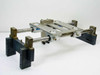 Thomson SSUPB16 linear guide assembly — opposite 3/4 angle showing dual parallel shafts, pillow blocks with blue Thomson labels, grease fittings, and aluminum table top