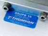 Close-up of blue Thomson Industries label on pillow block reading SSUPB16 Super Smart Pillow Block — Port Washington NY USA