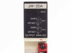 Sharp JW-2DA front panel close-up showing RUN indicator, Gain and Offset trim pots for CH.1 and CH.2, and OUTPUT ANALOG label