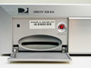 DirecTV DVR R10 front access door open showing receiver ID barcode label and Reset button