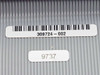 Exabyte 309724-002 part number label and date code label 9737 on flat ribbon cable surface
