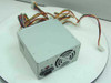 Fortron Source FS200S60GP 235W ATX power supply – three-quarter front view showing fan, power switch, and cable harness