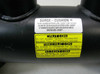 Thermal Transfer 4F352 — close-up of Surge-Cushion flow bypass relief label and multilingual caution/pressure rating decals on shell
