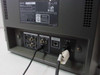 Sony PVM-20L1 rear connector panel close-up — VIDEO IN/OUT BNC and RCA connectors, AUDIO IN/OUT RCA, PARALLEL REMOTE port, and AC IN inlet with power cord