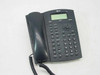 AT&T 955 4-line corded speakerphone – front three-quarter view showing handset, keypad, and LCD display