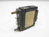 Airpax 205-1-11REC2-2480-1 30A DC circuit breaker – angled front/side view showing body and rating label