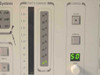 Newport ORION-CM front panel close-up of photo current bar graph meter (10^-9 to 10^-2 A scale), control section with ALIGN and CENTER buttons, and GAIN display showing 50