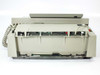 IBM 6770 Wheelwriter System/40 — rear view with bottom cover panel removed, exposing main circuit boards, expansion connectors, and internal wiring