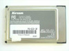 Xircom PS-CEM-28 rear label showing model PS-CE2-10, PC Card 16-bit 5V, FCC markings, and Product of Malaysia sticker