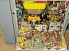 Interior of Decca Radar Type 65170 transceiver unit with cover open — magnetron assembly with yellow high-voltage discharge warning label, multiple circuit boards, transformers, and wiring
