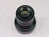 Elmo 50mm f/1.2 projection lens — top-down view looking into rear element showing rectangular aperture opening
