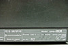 Commodore DPS-1101 rating plate showing Model DPS-1101, 120V 1A 60Hz, FCC ID BR97UP1101, Made in Japan, UL listed