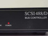 IOtech IEZ11-A2 front panel close-up showing SCSI 488/D Bus Controller labeling and illuminated red POWER LED