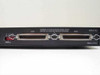 IOtech IEZ11-A2 rear panel right section showing dual 50-pin Centronics SCSI connectors, SCSI address DIP switches, and Made in U.S.A. label