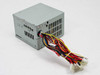 IBM Delta DPS-200PB-76A 200W ATX power supply – rear and left side view showing output harness and Molex connectors